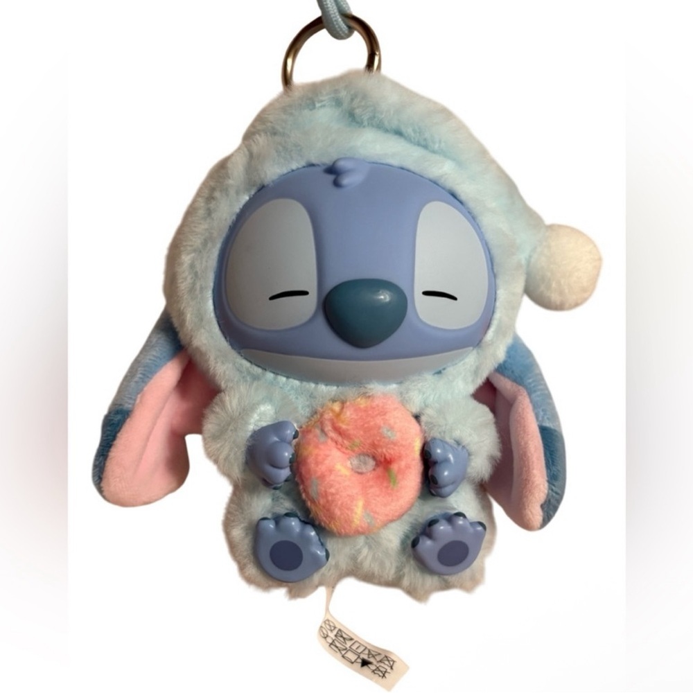 Disney MINISO Stitch Eat Something Before
Sleep Vinyl Plush KeychainSleepy Donut - Picture 2 of 9
